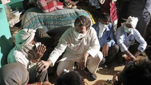 Congress leader Rahul Gandhi meeting the Hathras victim's family and extending condolences at village Boolgarhi in Hathras district.(ANI Photo) Congress leader Rahul Gandhi meeting the Hathras victim's family and extending condolences at village Boolgarhi in Hathras district.(ANI Photo)