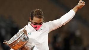 Tennis - French Open - Roland Garros, Paris, France - October 11, 2020 Spain’s Rafael Nadal celebrates with the trophy after winning the French Open final against Serbia’s Novak Djokovic REUTERS/Christian Hartmann(REUTERS) Tennis - French Open - Roland Garros, Paris, France - October 11, 2020 Spain’s Rafael Nadal celebrates with the trophy after winning the French Open final against Serbia’s Novak Djokovic REUTERS/Christian Hartmann(REUTERS)