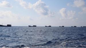 In this file picture, Chinese boats fish at the disputed Scarborough Shoal. Malaysia has detained 60 Chinese fishermen for entering territorial waters.(REUTERS) In this file picture, Chinese boats fish at the disputed Scarborough Shoal. Malaysia has detained 60 Chinese fishermen for entering territorial waters.(REUTERS)