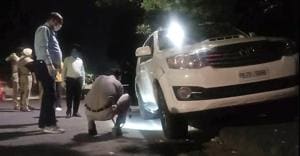 Police at the spot where former student leader Gurlal Brar, also alleged to be an aide of gangster Lawrence Bishnoi, was shot dead in the early hours of Sunday.(HT Photo) Police at the spot where former student leader Gurlal Brar, also alleged to be an aide of gangster Lawrence Bishnoi, was shot dead in the early hours of Sunday.(HT Photo)