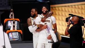 Los Angeles Lakers forward LeBron James (23) and forward Anthony Davis (3) celebrate during the fourth quarter in game six of the 2020 NBA Finals at AdventHealth Arena.(USA TODAY Sports) Los Angeles Lakers forward LeBron James (23) and forward Anthony Davis (3) celebrate during the fourth quarter in game six of the 2020 NBA Finals at AdventHealth Arena.(USA TODAY Sports)