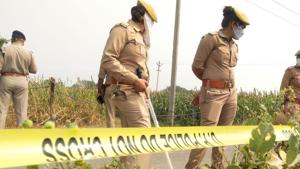 UP police at the crime scene where the Hathras woman was raped and brutalised. (HT Photo) UP police at the crime scene where the Hathras woman was raped and brutalised. (HT Photo)