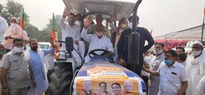 The tractor rally was led by Haryana education minister Kanwar Pal, Ambala MP Rattan Lal Kataria and former state minister Karan Dev Kamboj in Yamunanagar’s Jagadhri on Thursday.(HT Photo) The tractor rally was led by Haryana education minister Kanwar Pal, Ambala MP Rattan Lal Kataria and former state minister Karan Dev Kamboj in Yamunanagar’s Jagadhri on Thursday.(HT Photo)