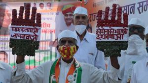 Congress Seva Dal members at a protest against new farm laws, in Jaipur, Rajasthan on October 10.(HT photo) Congress Seva Dal members at a protest against new farm laws, in Jaipur, Rajasthan on October 10.(HT photo)