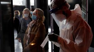 A health worker, wearing a protective suit and a face mask, prepares to administer a nasal swab to a patient in a temporary testing site for the coronavirus disease (Covid-19) at the Zenith Arena in Lille, France, October 15, 2020.(Reuters photo for representation) A health worker, wearing a protective suit and a face mask, prepares to administer a nasal swab to a patient in a temporary testing site for the coronavirus disease (Covid-19) at the Zenith Arena in Lille, France, October 15, 2020.(Reuters photo for representation)