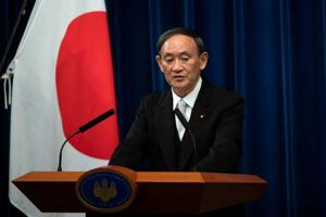 FILE PHOTO: Yoshihide Suga speaks during a news conference following his confirmation as Prime Minister of Japan in Tokyo, Japan September 16, 2020. Carl Court/Pool via REUTERS/File Photo) FILE PHOTO: Yoshihide Suga speaks during a news conference following his confirmation as Prime Minister of Japan in Tokyo, Japan September 16, 2020. Carl Court/Pool via REUTERS/File Photo)