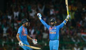 Dinesh Karthik celebrates with Washington Sundar after scoring the winning runs for India.(Getty Images) Dinesh Karthik celebrates with Washington Sundar after scoring the winning runs for India.(Getty Images)