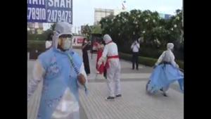 The image shows students performing garba wearing garba costumes made of PPE kits.(ANI) The image shows students performing garba wearing garba costumes made of PPE kits.(ANI)