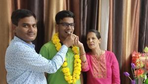 Prithvi Raj Singh celebrating with his parents.(Handout) Prithvi Raj Singh celebrating with his parents.(Handout)
