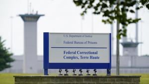 File photo shows the federal prison complex in Terre Haute, Ind. A woman convicted of fatally strangling a pregnant woman, cutting her body open and kidnapping her baby is scheduled to be the first female inmate put to death by the U.S. government in more than six decades, the Justice Department said Friday.(AP Photo) File photo shows the federal prison complex in Terre Haute, Ind. A woman convicted of fatally strangling a pregnant woman, cutting her body open and kidnapping her baby is scheduled to be the first female inmate put to death by the U.S. government in more than six decades, the Justice Department said Friday.(AP Photo)