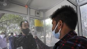 A health worker collects a swab sample for coronavirus tests, at Sector 30 in District Hospital, Noida.(Sunil Ghosh / Hindustan Times) A health worker collects a swab sample for coronavirus tests, at Sector 30 in District Hospital, Noida.(Sunil Ghosh / Hindustan Times)