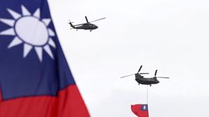 Helicopters fly over President Office with Taiwan National flag during the National Day celebrations in Taipei, Taiwan.(AP) Helicopters fly over President Office with Taiwan National flag during the National Day celebrations in Taipei, Taiwan.(AP)