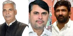 From left: Kapoor Singh Narwal, Congress candidate Indu Raj Narwal and BJP’s Yogeshwar Dutt. Kapoor Singh pulled out of the contest for the Baroda byelection on Monday.(HT Photo)