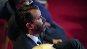 Donald Trump Jr. listens during the first presidential debate.(AP) Donald Trump Jr. listens during the first presidential debate.(AP)