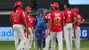 Kings XI Punjab players during the Indian Premier League (IPL) T20 cricket match against Mumbai Indians (MI), at Dubai International Cricket Stadium in Dubai.(PTI) Kings XI Punjab players during the Indian Premier League (IPL) T20 cricket match against Mumbai Indians (MI), at Dubai International Cricket Stadium in Dubai.(PTI)