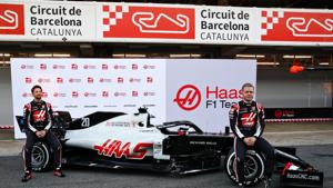 Romain Grosjean of France and Haas F1 and Kevin Magnussen of Denmark and Haas F1 are pictured at the roll out of the Haas F1 Team VF-20 Ferrari during day one of Formula 1 Winter Testing at Circuit de Barcelona-Catalunya on February 19, 2020 in Barcelona, Spain.(Getty Images) Romain Grosjean of France and Haas F1 and Kevin Magnussen of Denmark and Haas F1 are pictured at the roll out of the Haas F1 Team VF-20 Ferrari during day one of Formula 1 Winter Testing at Circuit de Barcelona-Catalunya on February 19, 2020 in Barcelona, Spain.(Getty Images)