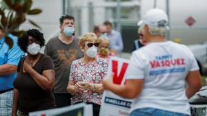 People line up at the Supervisor of Elections Office polling station as early voting begins in Pinellas County ahead of the election in Largo, Florida, US on October 21, 2020.(Reuters Photo) People line up at the Supervisor of Elections Office polling station as early voting begins in Pinellas County ahead of the election in Largo, Florida, US on October 21, 2020.(Reuters Photo)