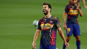 Soccer Football - La Liga Santander - FC Barcelona v Osasuna - Camp Nou, Barcelona, Spain - July 16, 2020 Barcelona's Gerard Pique during the warm up, as play resumes behind closed doors following the outbreak of the coronavirus disease (COVID-19) REUTERS/Albert Gea/File Photo(REUTERS) Soccer Football - La Liga Santander - FC Barcelona v Osasuna - Camp Nou, Barcelona, Spain - July 16, 2020 Barcelona's Gerard Pique during the warm up, as play resumes behind closed doors following the outbreak of the coronavirus disease (COVID-19) REUTERS/Albert Gea/File Photo(REUTERS)