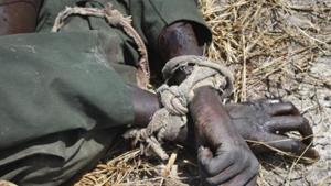 FILE - In this Sunday, Oct. 16, 2016 file photo, the body of a rebel soldier who died in a battle days before has his hands tied, in Malakal, South Sudan. The latest report on human rights abuses in South Sudan's five-year civil war, released by a United Nations commission Friday, Feb. 23, 2018 says it has identified more than 40 senior military officials "who may bear individual responsibility for war crimes." (AP Photo/Justin Lynch, File)(AP) FILE - In this Sunday, Oct. 16, 2016 file photo, the body of a rebel soldier who died in a battle days before has his hands tied, in Malakal, South Sudan. The latest report on human rights abuses in South Sudan's five-year civil war, released by a United Nations commission Friday, Feb. 23, 2018 says it has identified more than 40 senior military officials "who may bear individual responsibility for war crimes." (AP Photo/Justin Lynch, File)(AP)