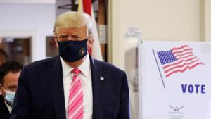 US President Donald Trump wearing a face mask leaves after voting in the 2020 presidential election at the Palm Beach County Library in West Palm Beach, US on October 24, 2020.(REUTERS PHOTO.) US President Donald Trump wearing a face mask leaves after voting in the 2020 presidential election at the Palm Beach County Library in West Palm Beach, US on October 24, 2020.(REUTERS PHOTO.)