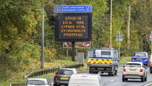 A matrix sign on the A48(M) heading towards Cardiff informing motorists to Wales entering a A matrix sign on the A48(M) heading towards Cardiff informing motorists to Wales entering a