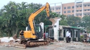 An excavator demolishing a structure of GITAM University in Visakhapatnam.(HT PHOTO) An excavator demolishing a structure of GITAM University in Visakhapatnam.(HT PHOTO)