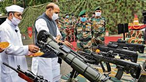 Defence minister Rajnath Singh performs ‘Shastra Puja’ at the Sukna Army Camp in Darjeeling on Sunday. Defence minister Rajnath Singh performs ‘Shastra Puja’ at the Sukna Army Camp in Darjeeling on Sunday.