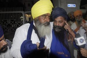 Injured Sikh activists after the clash with SGPC employees in Amritsar on Saturday. Injured Sikh activists after the clash with SGPC employees in Amritsar on Saturday.