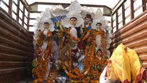 Devotees bring an idol of goddess Durga to immerse it in an immersion pit on the final day of Durga Puja Festival, at Sector - 56 near Kendriya Vihar, in Gurugram, India, on Monday, October 26, 2020. (Praveen Kumar/HT Photos) Devotees bring an idol of goddess Durga to immerse it in an immersion pit on the final day of Durga Puja Festival, at Sector - 56 near Kendriya Vihar, in Gurugram, India, on Monday, October 26, 2020. (Praveen Kumar/HT Photos)