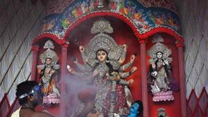 The state government has ordered a phase-wise immersion of idols to be completed within three days, starting Monday.(Representational photo/AFP) The state government has ordered a phase-wise immersion of idols to be completed within three days, starting Monday.(Representational photo/AFP)