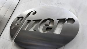 Pfizer company logo at the company's headquarters in New York. Pfizer is reporting a third-quarter profit of $2.19 billion.(AP) Pfizer company logo at the company's headquarters in New York. Pfizer is reporting a third-quarter profit of $2.19 billion.(AP)