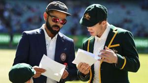 Virat Kohli and Tim Paine at the toss.(Getty Images) Virat Kohli and Tim Paine at the toss.(Getty Images)