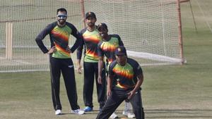 Zimbabwe players Chamu Chibhabha, front to back, Donald Tiripano, Sikandar Raza and Faraz Akram attend a practice session at the Pindi Cricket Stadium, in Rawalpindi, Pakistan.(AP)