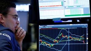 A specialist trader works at his post on the floor of the New York Stock Exchange (NYSE) in New York, US.(Reuters) A specialist trader works at his post on the floor of the New York Stock Exchange (NYSE) in New York, US.(Reuters)
