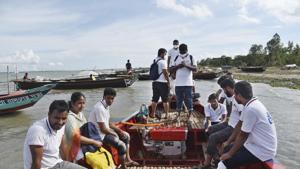 Chandpur : In this photo provided by Bidyanondo Foundation, doctors and health workers arrive at a village in Chandpur district in eastern Bangladesh, on Sept. 12, 2020. A Bangladeshi charity has set up a floating hospital turning a small tourist boat into a healthcare facility to provide services to thousands of people affected by this year's devastating floods that marooned millions.(AP) Chandpur : In this photo provided by Bidyanondo Foundation, doctors and health workers arrive at a village in Chandpur district in eastern Bangladesh, on Sept. 12, 2020. A Bangladeshi charity has set up a floating hospital turning a small tourist boat into a healthcare facility to provide services to thousands of people affected by this year's devastating floods that marooned millions.(AP)