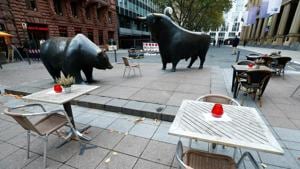 Empty tables are pictured in front of the bull and bear statues outside Frankfurt's stock exchange as the coronavirus disease (Covid-19) outbreak continues in Frankfurt, Germany on October 29, 2020.(Reuters Photo) Empty tables are pictured in front of the bull and bear statues outside Frankfurt's stock exchange as the coronavirus disease (Covid-19) outbreak continues in Frankfurt, Germany on October 29, 2020.(Reuters Photo)