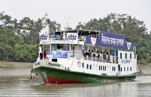 In this photo provided by Bidyanondo Foundation, floating hospital called ‘Jibon Kheya’,meaning lifeboat, arrives at Banishanta near Mongla seaport in southwestern region of Bangladesh, Sept. 1, 2020.. A Bangladeshi charity has set up a floating hospital turning a small tourist boat into a healthcare facility to provide services to thousands of people affected by this year's devastating floods that marooned millions. ( (AP) In this photo provided by Bidyanondo Foundation, floating hospital called ‘Jibon Kheya’,meaning lifeboat, arrives at Banishanta near Mongla seaport in southwestern region of Bangladesh, Sept. 1, 2020.. A Bangladeshi charity has set up a floating hospital turning a small tourist boat into a healthcare facility to provide services to thousands of people affected by this year's devastating floods that marooned millions. ( (AP)