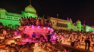 Devotees light earthen lamps on the bank of Saryu River during Deepotsav celebrations in Ayodhya in 2019.(PTI FILE) Devotees light earthen lamps on the bank of Saryu River during Deepotsav celebrations in Ayodhya in 2019.(PTI FILE)