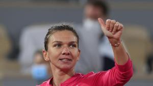 Romania's Simona Halep flashes a thumbs up.(AP) Romania's Simona Halep flashes a thumbs up.(AP)