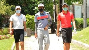 Ajeetesh Sandhu, Karandeep Kochhar and Adil Bedi during a round of golf at Chandigarh Golf Club. All three will be seen in action at the pro golf event starting November 4.(Keshav Singh/HT)