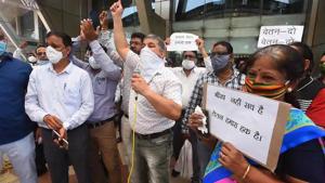 Aam Aadmi Party supporters and MCD employees raise slogans during a protest against the non payment of salaries of MCD employees outside Civic Center, in New Delhi.(Raj K Raj/HT File Photo) Aam Aadmi Party supporters and MCD employees raise slogans during a protest against the non payment of salaries of MCD employees outside Civic Center, in New Delhi.(Raj K Raj/HT File Photo)