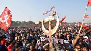 CPI(M) activists hold flags and huge party symbol in an open rally at Bridge Parade Ground in Kolkata.(PTI File Photo) CPI(M) activists hold flags and huge party symbol in an open rally at Bridge Parade Ground in Kolkata.(PTI File Photo)