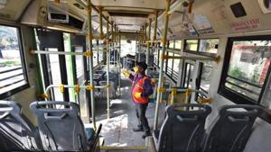Delhi Transport Corporation (DTC) cleaning staff chemically disinfect a bus as a precautionary measure against the spread of coronavirus, at DTC Depot Rajghat in New Delhi.(Raj K Raj/HT Photo) Delhi Transport Corporation (DTC) cleaning staff chemically disinfect a bus as a precautionary measure against the spread of coronavirus, at DTC Depot Rajghat in New Delhi.(Raj K Raj/HT Photo)