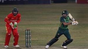 Rawalpindi:Pakistani batsman Babar Azam, right, plays a shot while Zimbabwe's wicketkeeper Brendan Taylor, watches during their 2nd one-day international cricket match at the Pindi Cricket Stadium, in Rawalpindi, Pakistan, Sunday, Nov. 1, 2020. AP/PTI Photo)(AP01-11-2020_000191A)(AP) Rawalpindi:Pakistani batsman Babar Azam, right, plays a shot while Zimbabwe's wicketkeeper Brendan Taylor, watches during their 2nd one-day international cricket match at the Pindi Cricket Stadium, in Rawalpindi, Pakistan, Sunday, Nov. 1, 2020. AP/PTI Photo)(AP01-11-2020_000191A)(AP)