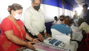 Electronic Voting Machine (EVM) sealing officers checking EVMs and Voter Verified Paper Audit Train (VVPATs) ahead of the second phase of Bihar Assembly Elections, at Bankipur Girls High School, in Patna, Bihar on Friday.(Santosh Kumar/HT Photo) Electronic Voting Machine (EVM) sealing officers checking EVMs and Voter Verified Paper Audit Train (VVPATs) ahead of the second phase of Bihar Assembly Elections, at Bankipur Girls High School, in Patna, Bihar on Friday.(Santosh Kumar/HT Photo)