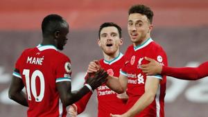 Liverpool's Diogo Jota celebrates scoring their second goal with teammates.(Pool via REUTERS) Liverpool's Diogo Jota celebrates scoring their second goal with teammates.(Pool via REUTERS)