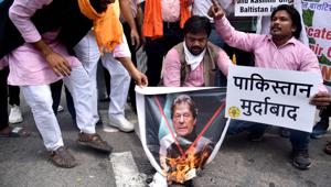 Member of Hindu Sena burn a poster of Pakistan PM Imran Khan during a protest against illegal annexure of Gilgit Baltistan into Pakistan, in September.(ANI file) Member of Hindu Sena burn a poster of Pakistan PM Imran Khan during a protest against illegal annexure of Gilgit Baltistan into Pakistan, in September.(ANI file)