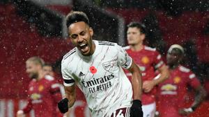 Soccer Football - Premier League - Manchester United v Arsenal - Old Trafford, Manchester, Britain - November 1, 2020 Arsenal's Pierre-Emerick Aubameyang celebrates scoring their first goal(Pool via REUTERS) Soccer Football - Premier League - Manchester United v Arsenal - Old Trafford, Manchester, Britain - November 1, 2020 Arsenal's Pierre-Emerick Aubameyang celebrates scoring their first goal(Pool via REUTERS)