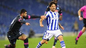 Real Sociedad's David Silva, right, vies for the ball with Napoli's Elseid Hysaj during the Europa League group F soccer match between Real Sociedad and Napoli at the Anoeta stadium in San Sebastian, Spain, Thursday, Oct. 29, 2020.(AP) Real Sociedad's David Silva, right, vies for the ball with Napoli's Elseid Hysaj during the Europa League group F soccer match between Real Sociedad and Napoli at the Anoeta stadium in San Sebastian, Spain, Thursday, Oct. 29, 2020.(AP)