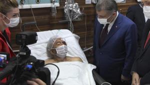 Turkey's Health Minister Fahrettin Koca, right, visits Ahmet Citim, rescued from the debris of his collapsed house, in Izmir, Turkey, Sunday.(AP Photo) Turkey's Health Minister Fahrettin Koca, right, visits Ahmet Citim, rescued from the debris of his collapsed house, in Izmir, Turkey, Sunday.(AP Photo)